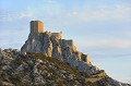 Les derniers rayons du soleil éclairent encore le château de Quéribus. aude,chateaux cathares,queribus,cucugnan 